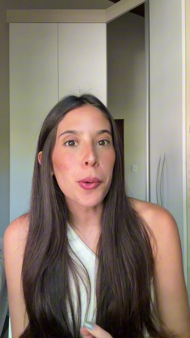 A creator recording a short-form video, captions applied